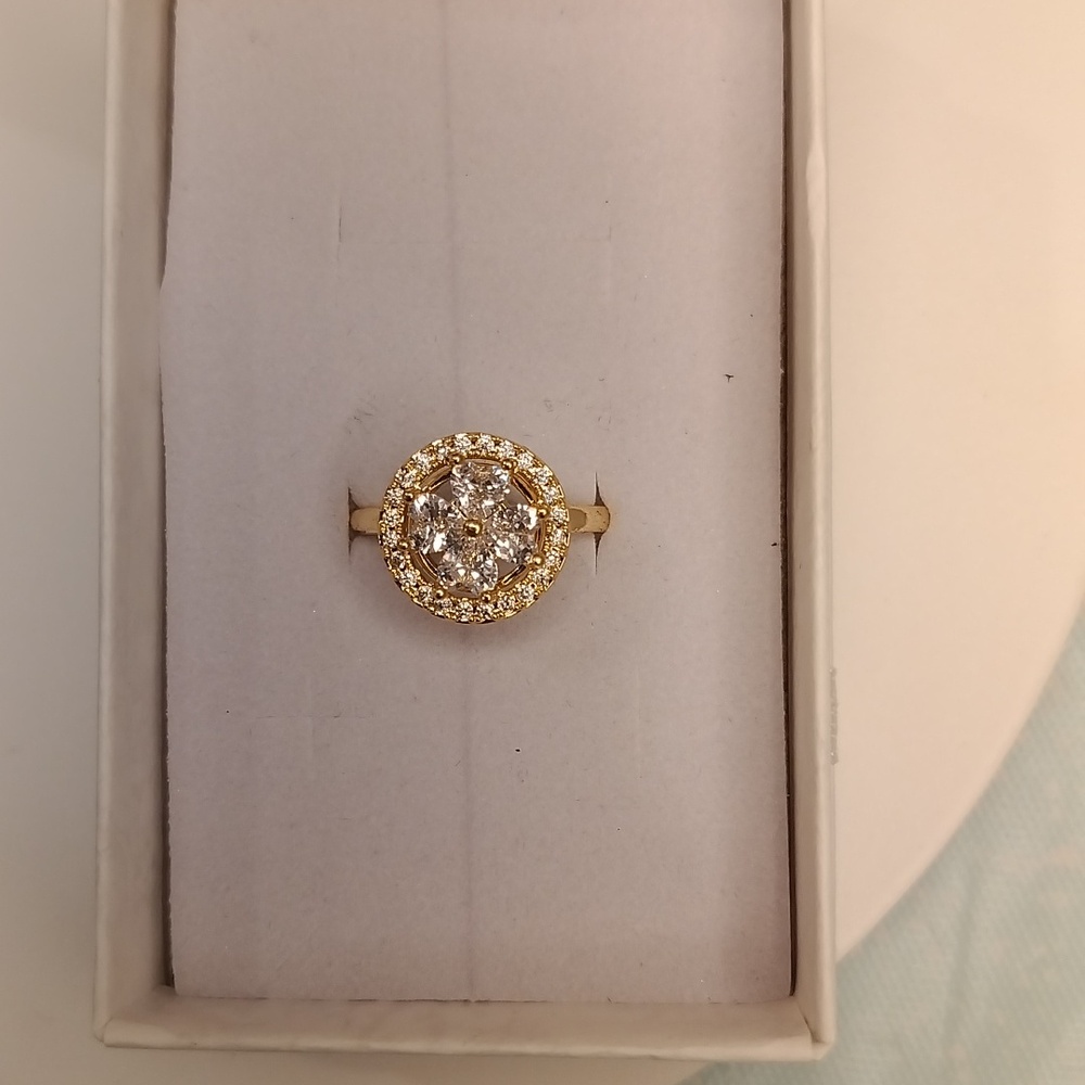 Gold spinning flower ring